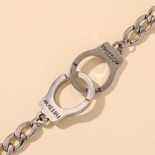 Bracelet in stainless steel chain with handcuffs freedom