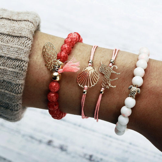 Bohemian bracelets in a set of 4 pink unicorn