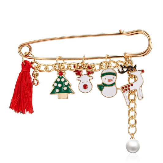 Brooch as a safety pin with Santa Claus, Christmas tree & snowman