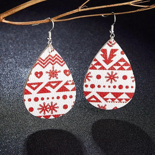 Drop shaped festive earrings with Christmas motif sweet reindeer leather