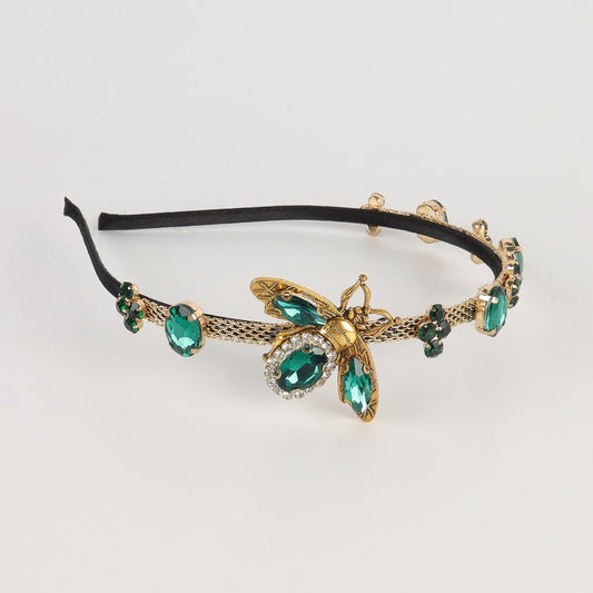 Luxurious diadem with precious stones and brooches insect gold green