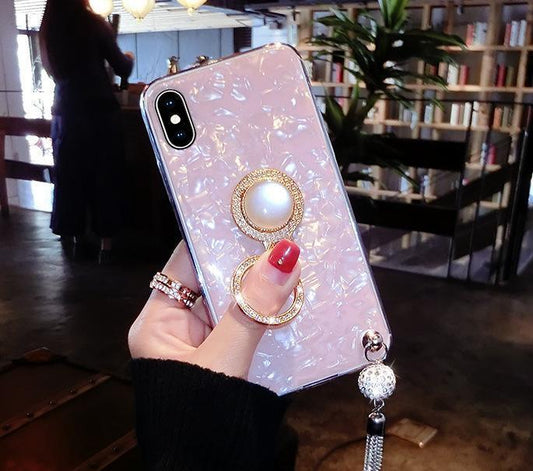 Mobile cover in artificial mother-of-pearl with tassle and ring holder