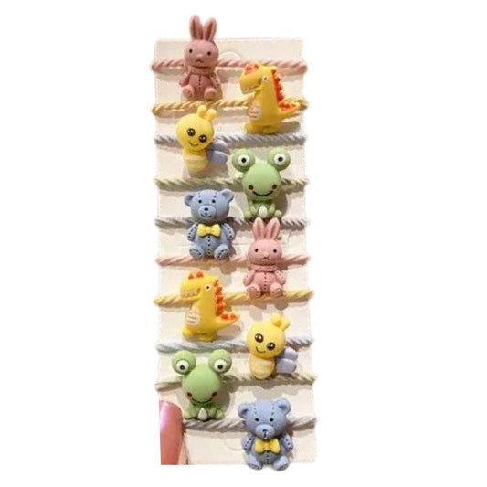 Set of colorful funny figures tassels rubber bands frog bee rabbit