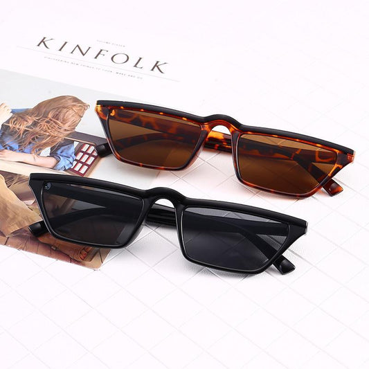 Small rectangular sunglasses trend 2024 Black nose tip