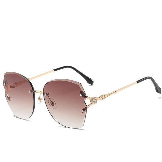 Sunglasses with beautiful frames in gold brown gray UV400