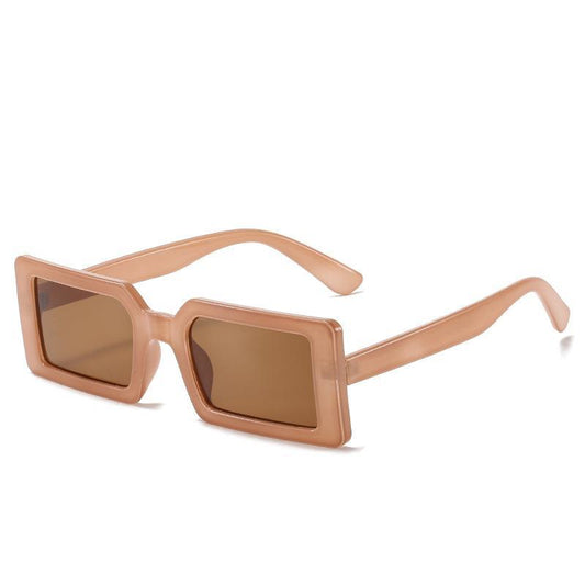 Trendy sunglasses with rectangular frames in retro beige