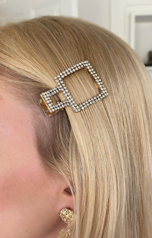 Trendig hårklämma i form av kvadrat klädd med strass som glimmar