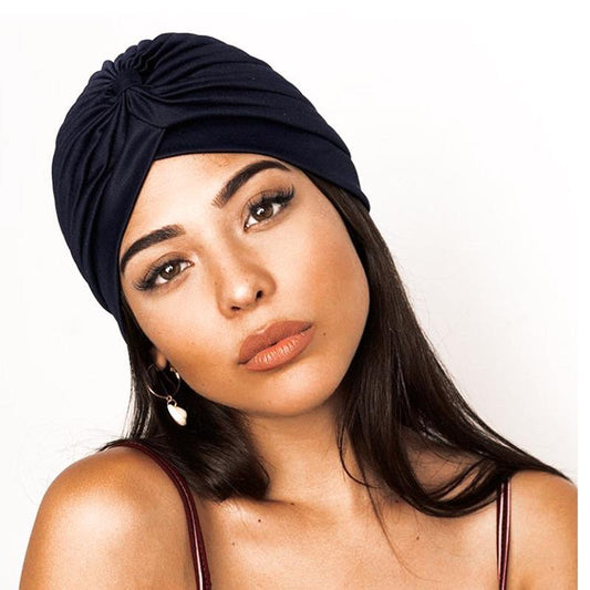 The turban in luxurious colors wrap hair suits everyone