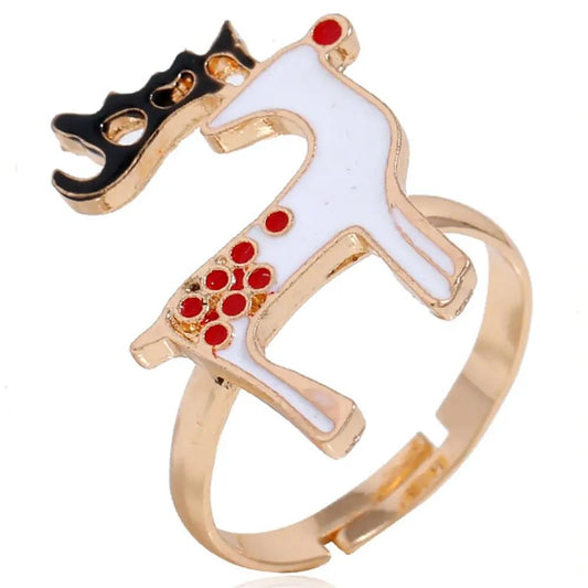 Beautiful funny ringed white reindeer with red spots