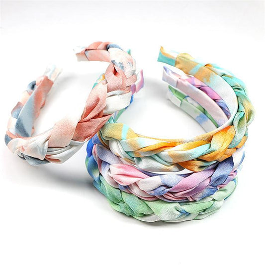 Beautiful braided diadem in summer pastel colors