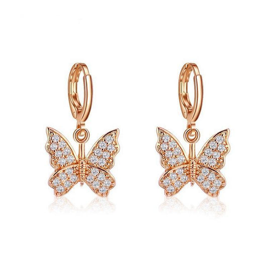 Earrings with butterflies in rhinestones in silver and gold plating