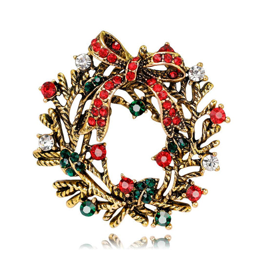 Brooch with red, green stones and red bow Christmas party
