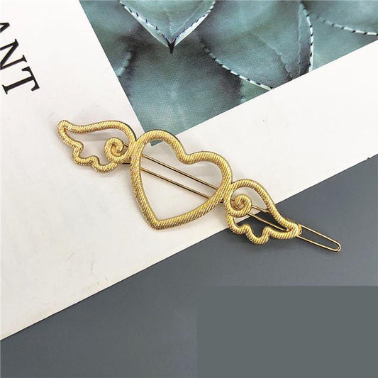 Handmade gold plated hair clip heart with wings