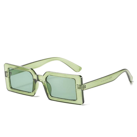 Trendy sunglasses with rectangular frames in retro green