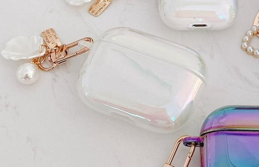 Airpods Pro shell in white mother-of-pearl with sweet jewelry