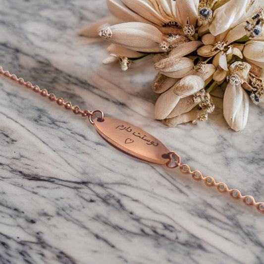 Armband i roséguld med text ''Dostat daram' på persiska present julklapp