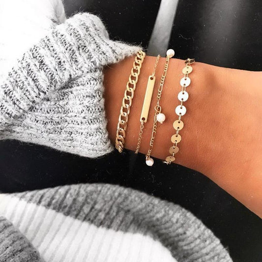 Bracelet in a set of 4 gold bohemian jewelry pearls