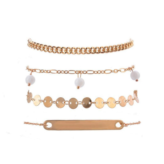 Bracelet in a set of 4 gold bohemian jewelry pearls