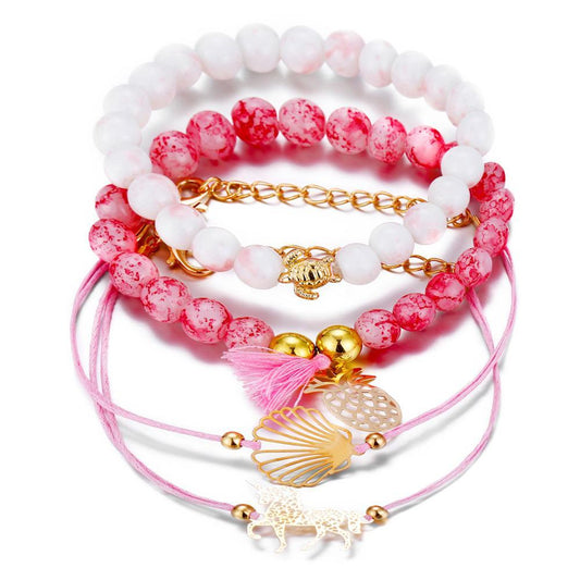 Bohemian bracelets in a set of 4 pink unicorn