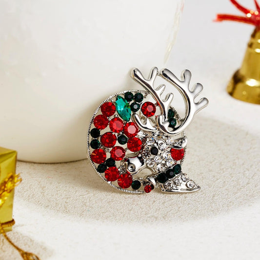 Brooch with a reindeer with horns in the moonlight rhinestone silver