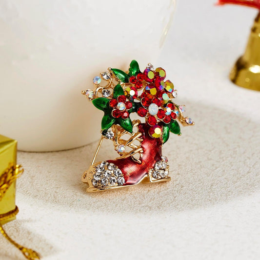 Brooch with Santa shoe that is filled with a beautiful bouquet