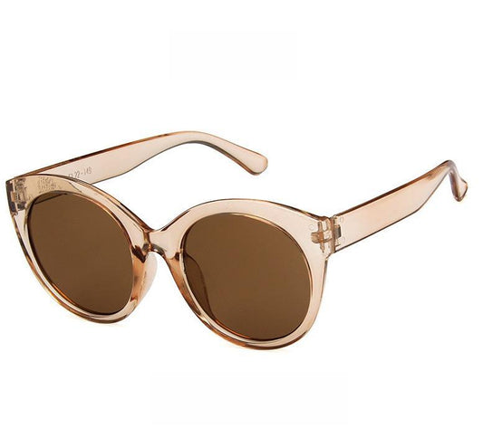 Cool round beige sunglasses trend summer 2022