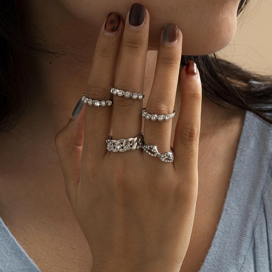 Elegant set with 5 rings in silver and silver-plated crystal