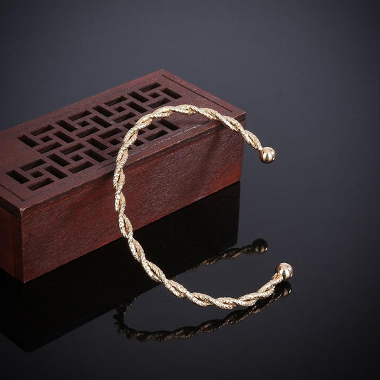 Simple handmade bracelet with gold plating