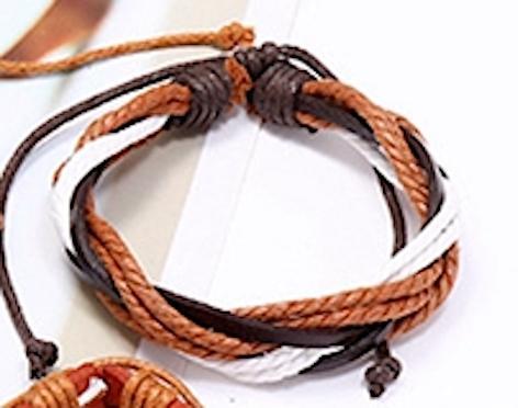 Braided bracelet with cords and leather strap