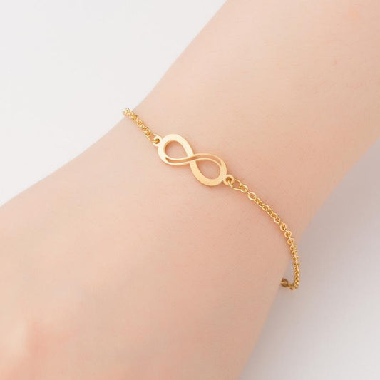 Guldpläterat armband med evighetssymbol för dam