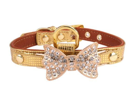 Necklace with rhinestones and bow in metallic gold and vegan leather