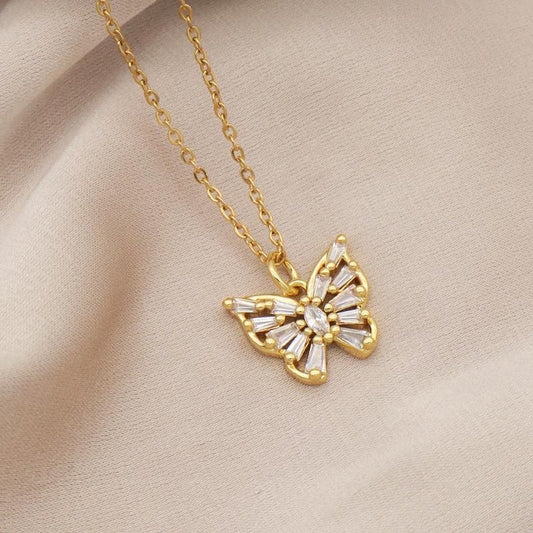 Necklace with beautiful butterfly in gold and rhinestone long chain