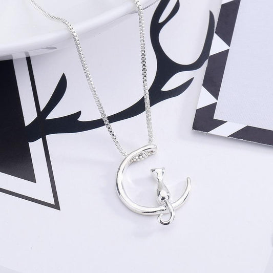 Halsband måne med katt i både silver och guld