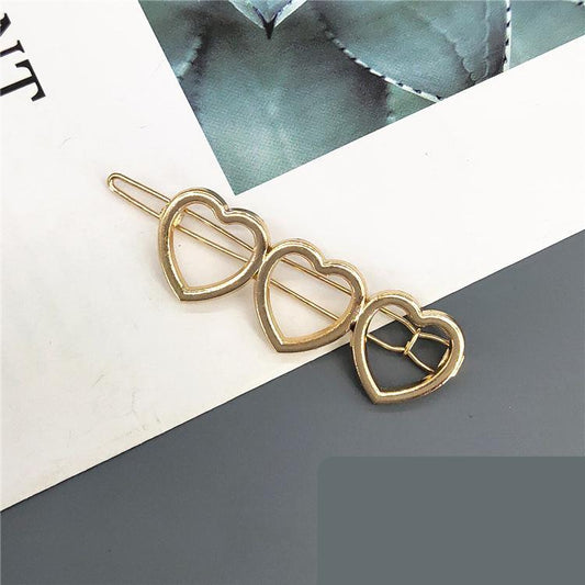 Handmade gold plated hair clip heart with wings