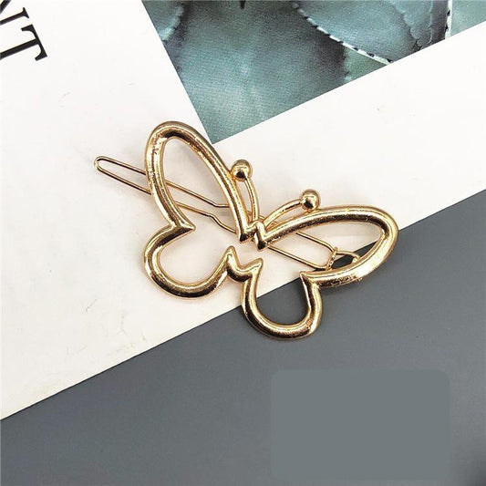 Handmade gold-plated hair clip with butterfly motif