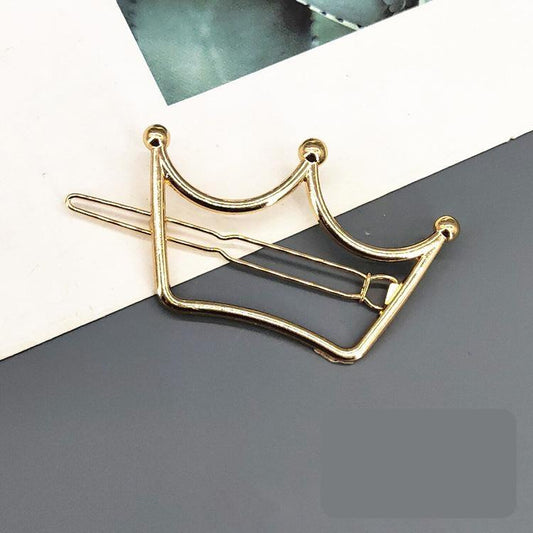 Handmade gold-plated hair clip with royal crown motif
