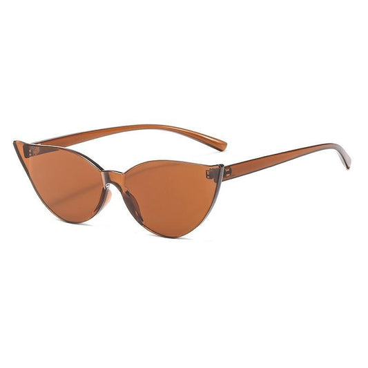 Ramlösa solglasögon i cat-eye modell bruna detaljlösa minimalism