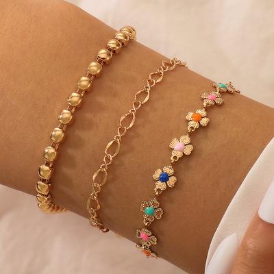 Set of 3 rhodium-plated bracelets with flowers in different colors