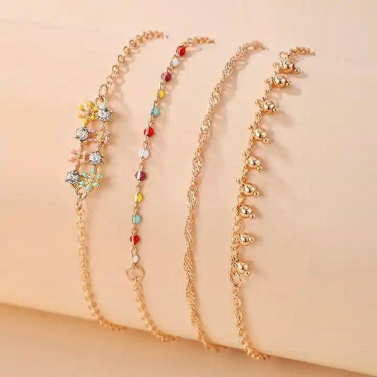Set á 4 stk orientaliska rhodiumpläterade armband med stenar smycken