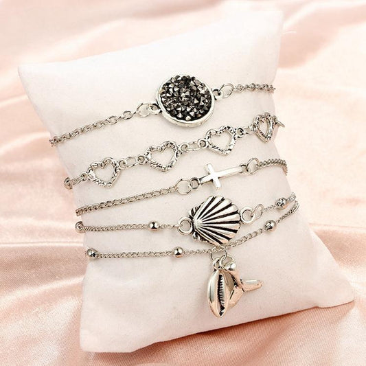 Set á 5 stk silverpläterade armband med snäckor, hjärtan, stenar