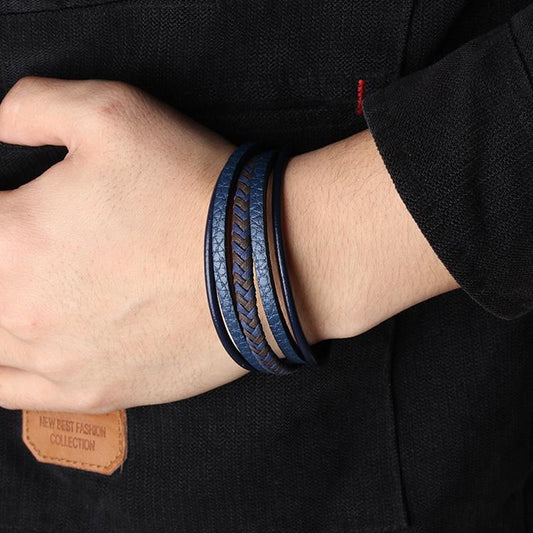 Set m flätade armband i blått läder med magnet