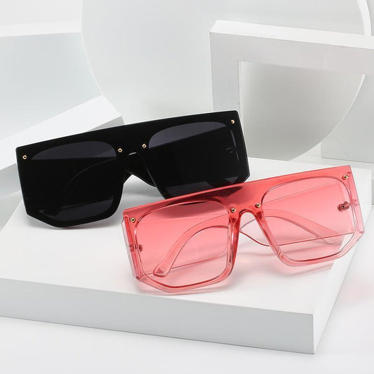 Solglasögon unisex bred bågar elastiskt material I rosa färg