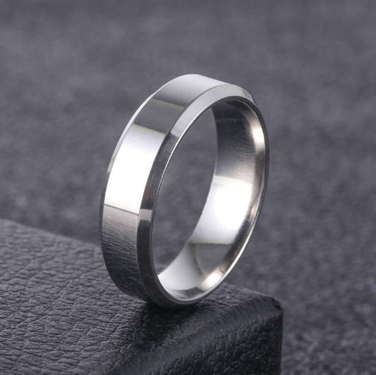 Traditional classic silver colored steel ring with a feminine touch