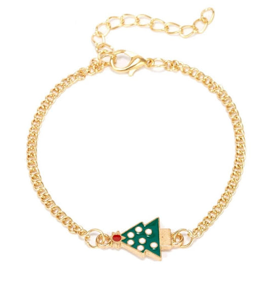 Vackert armband i guld med julgran med vita kulor
