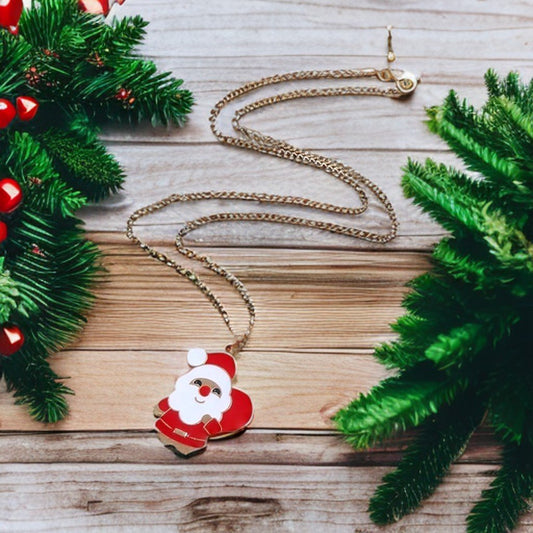Vackert roligt halsband tomte med tomteluva jultomte guld säck
