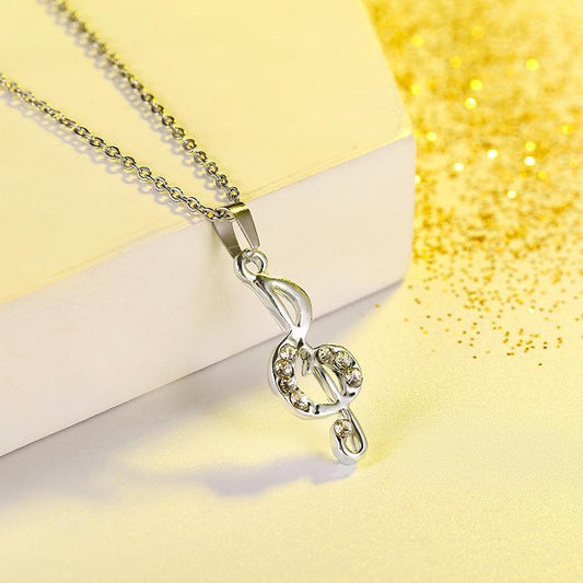 Vackert silverpläterat halsband med g-klav  ð„ž m. strass musik