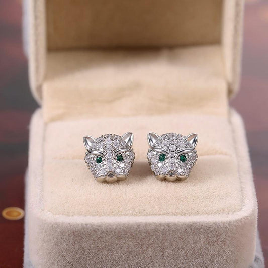 Vackra örhängen i sterling silver med kattdjur gröna ögon