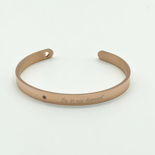 Stainless steel bracelet with cut-out heart and diamond