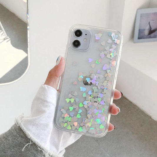 iPhone 14 Pro case with floating hearts like quicksand glitter