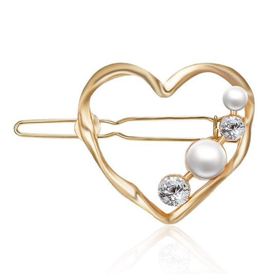 Beautiful hair clip with rhinestones and pearls in the heart